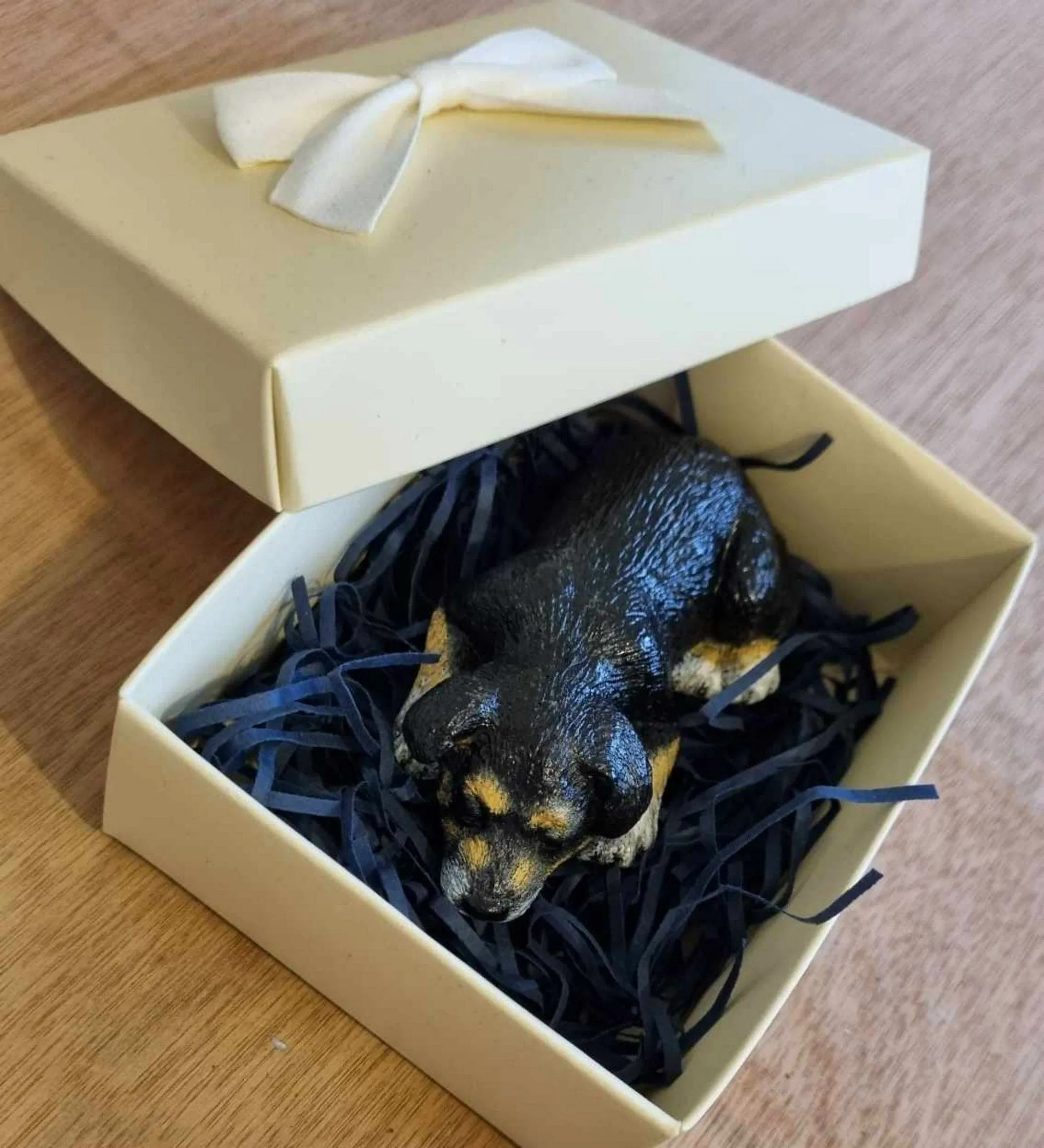 Dog shaped fur and ash memorial urn made from eco friendly resin, pet memorial keepsake